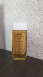 Clarins Lotus huile 125 ml voor gemengde tot vette huid., Ophalen of Verzenden, Nieuw, Gehele gezicht, Verzorging