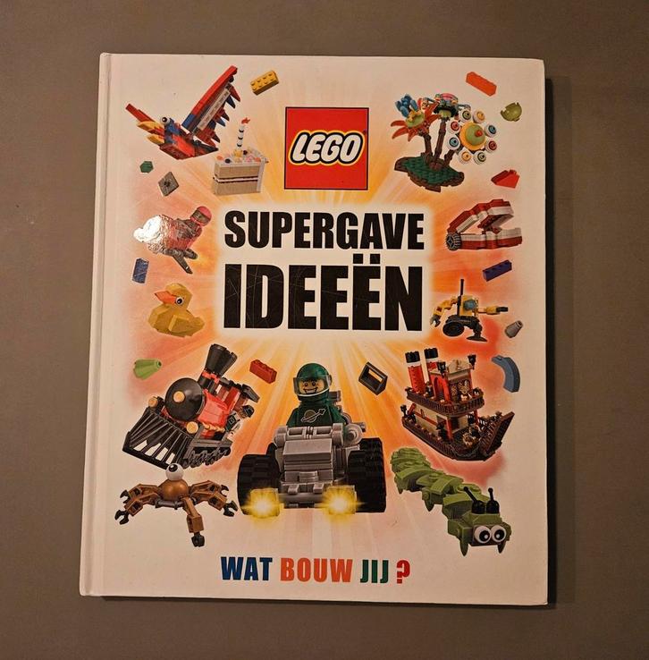 LEGO Supergave Ideeën - Wat Bouw Jij?, Boeken, Hobby en Vrije tijd, Zo goed als nieuw, Scrapbooking en Knutselen, Geschikt voor kinderen