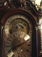 Staande klok, Ophalen