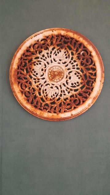 gietijzeren blad gebruikt als wanddecoratie  beschikbaar voor biedingen