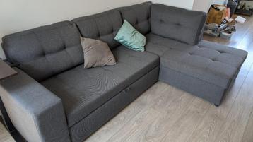 Hoekbank grijs met slaapfunctie en opbergruimte beschikbaar voor biedingen