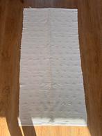 Wit vloerkleed, Ophalen