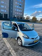Toyota Aygo 1.0 12V Vvt-i 5DRS 2006 Blauw, Auto's, Voorwielaandrijving, Zwart, 68 pk, Origineel Nederlands