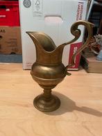 Koperen kandelaar en kan, Ophalen