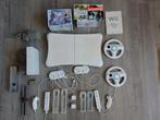 Over compleet wii set met controllers stuurtje en spellen, Ophalen of Verzenden, Zo goed als nieuw, Met 2 controllers