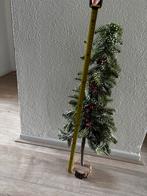 Decoratie kerstboom, Ophalen