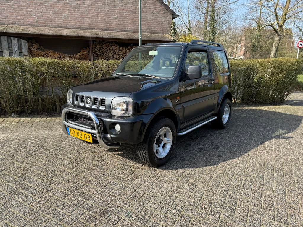 Suzuki Jimny 1.3 4WD 2005 Zwart Airco/trekhaak/carplay, Stof, 40 €/maand, Zwart, Stoelverwarming