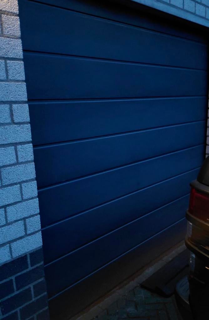 Elektrische geïsoleerde verano roldeur/garagedeur antraciet, Doe-het-zelf en Verbouw, Rolluiken, Ophalen, Zo goed als nieuw, 200 cm of meer