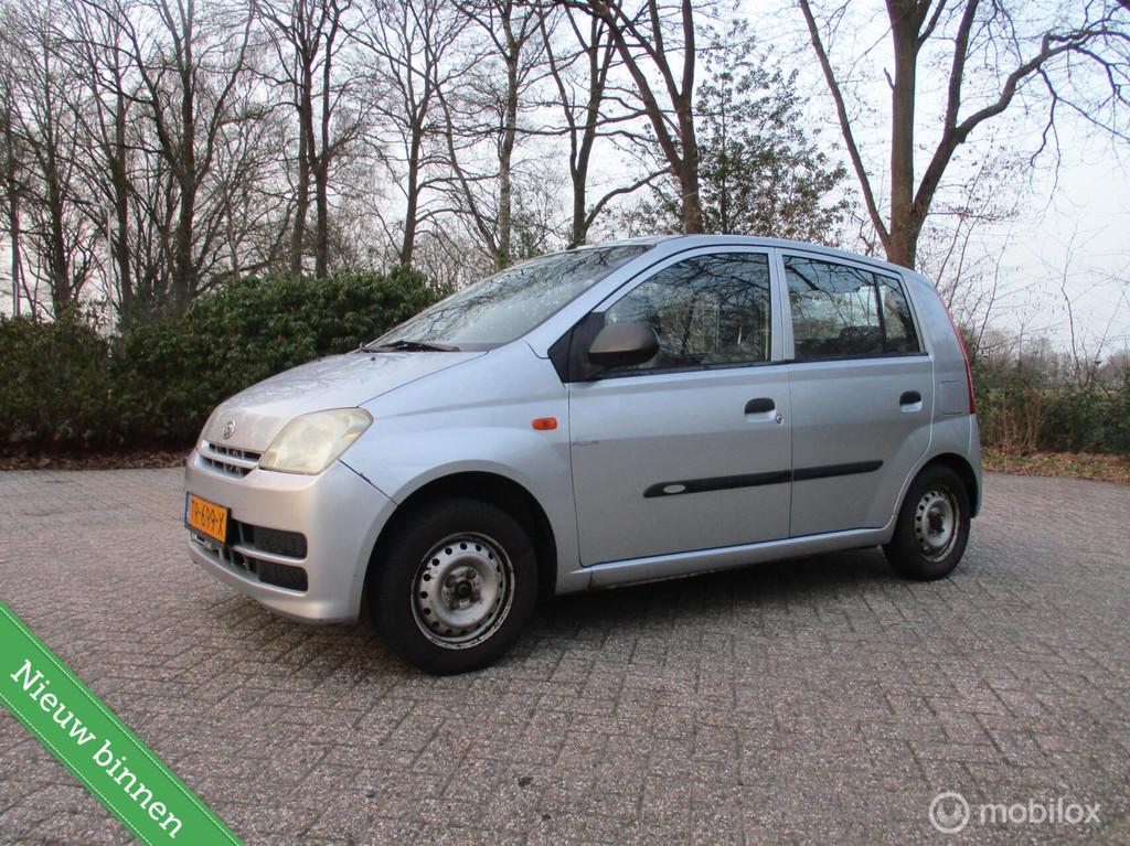 Daihatsu Cuore 1.0-12V Nagano apk 03-2027 airco, Auto's, Daihatsu, Stof, Cuore, Handgeschakeld, 3 cilinders