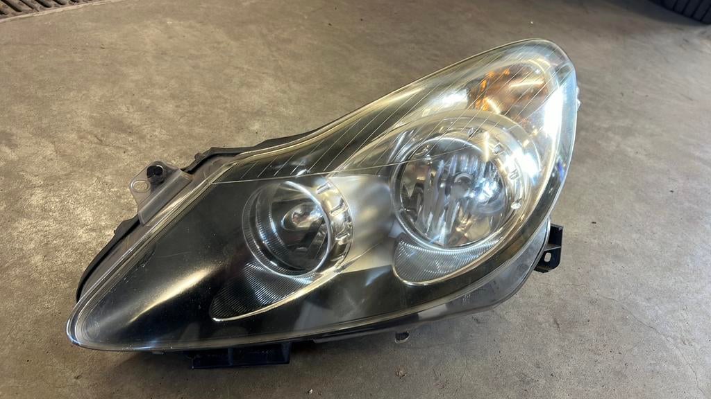 Originele koplamp links Opel Corsa D H7 H1, Auto-onderdelen, Ophalen of Verzenden, Gebruikt, Opel