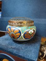 Puntgave rozensteker gouda plateel, Ophalen