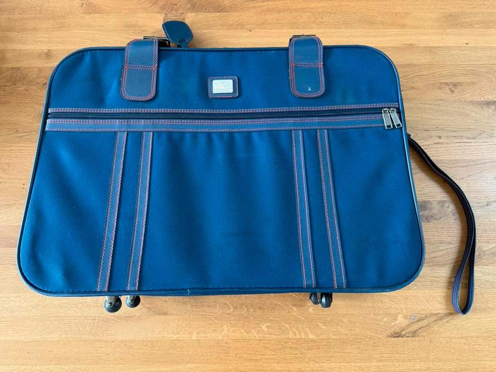 Blauwe koffer 67x47x18cm met wieltjes, Gebruikt, 45 tot 55 cm, Zacht kunststof, Uitschuifbare handgreep