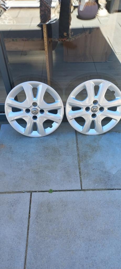 Twee Opel wieldoppen - Gebruikt, Auto diversen, Wieldoppen, Ophalen of Verzenden, Gebruikt
