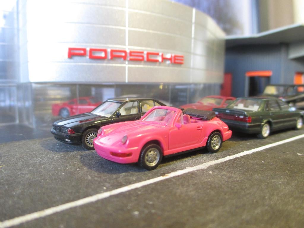 Porsche 964 911 Carrera 4 Cabrio met versteIbare spoiler #1, Ophalen of Verzenden, Gebruikt, Auto, Rietze