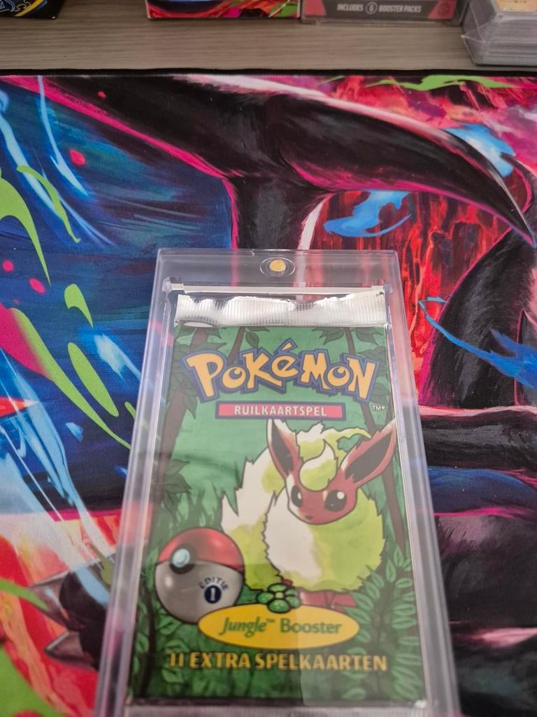 Pokémon Jungle Boosterpack NL 1st Edition Sealed Flareon, Ophalen, Nieuw, Booster