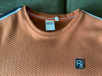 Tuniek met lange mouwen beschikbaar voor biedingen