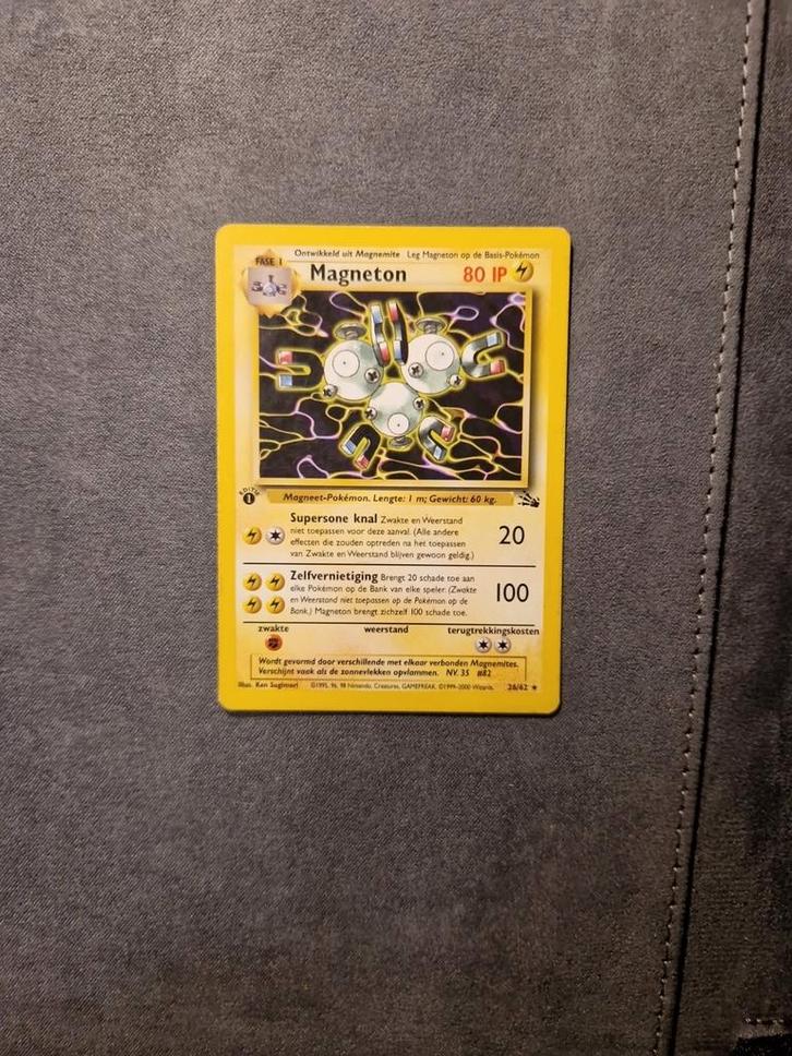 Magneton 26/62  Fossil First Edition NL 1999 Wotc, Hobby en Vrije tijd, Verzamelkaartspellen | Pokémon, Zo goed als nieuw, Losse kaart