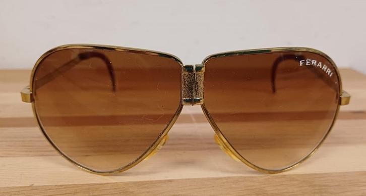 Opvouwbare Ferarri zonnebril, Sieraden, Tassen en Uiterlijk, Zonnebrillen en Brillen | Heren, Zonnebril, Overige merken, Ophalen of Verzenden