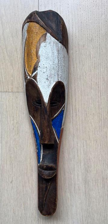 Decoratief houten masker beschikbaar voor biedingen