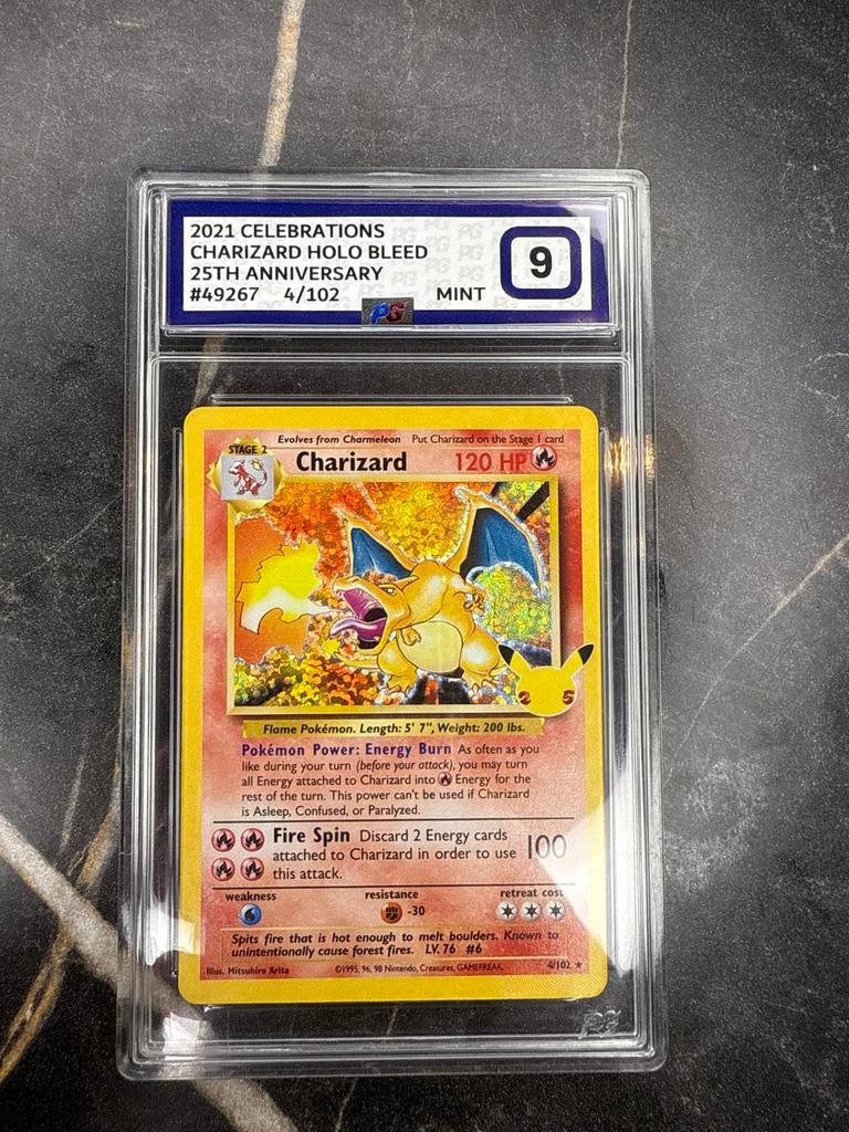 Charizard 4/102 25th Anniversary - PG 9 Mint, Verzenden, Zo goed als nieuw, Losse kaart, Foil