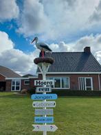 Geboortebord te huur, Ophalen