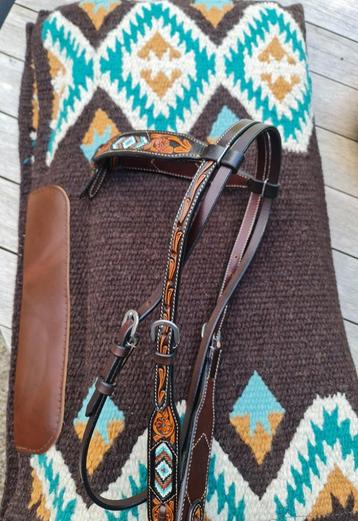 Diverse western saddlepads bij Cowgirl Store beschikbaar voor biedingen