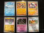 Pokemon Prismatic Evolutions base set holo en reverse holo., Ophalen of Verzenden, Zo goed als nieuw, Meerdere kaarten