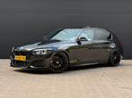 BMW M135i RWD |Nieuwe APK| AppleCarplay | Schuif/Kanteldak |, Achterwielaandrijving, 74 €/maand, Zwart, 438 pk