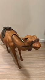 Vintage dromedaris, Ophalen