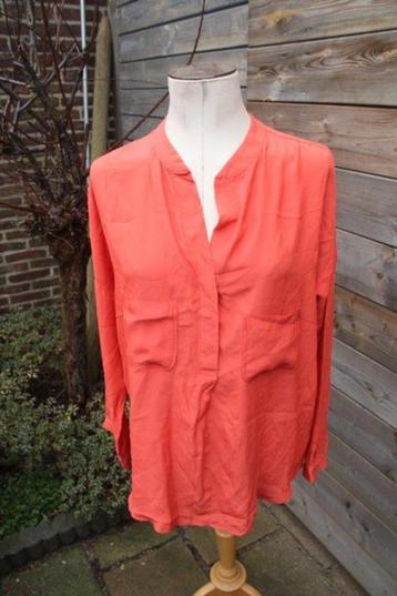 Tuniek oranje Atos Lombardini mt 48 IT (42EU)Vaste prijs AAN beschikbaar voor biedingen