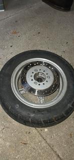 Scooter band met velg voor en achter, Ophalen