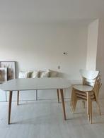 Witte ovale eettafel met houten poten, Huis en Inrichting, Tafels | Eettafels, 100 tot 150 cm, Ophalen of Verzenden, Zo goed als nieuw