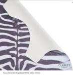 NIEUW! Clarke  Vloerkleed/Dierenvel Faux Zebra Skin € 42.49, Huis en Inrichting, Stoffering | Tapijten en Kleden, Nieuw, 100 tot 150 cm