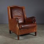 Vintage lederen Wingback fauteuil – bruin – metalen nagels, Metaal, Ophalen of Verzenden, Zo goed als nieuw