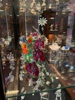Swarovski met Vitrinekast, Ophalen