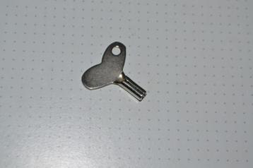 sleutel klokkenmannetje, miniklokje, souvenirklokje beschikbaar voor biedingen