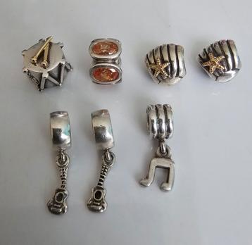 Prachtige zilveren en bicolor Pandora bedels  beschikbaar voor biedingen
