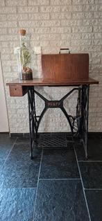 Antieke Pfaff naaimachine, Ophalen