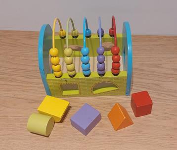 Houten kralenbaan met blokken beschikbaar voor biedingen