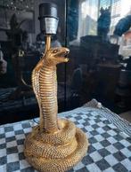 Goudkleurige slangen lamp
35 cm hoog, Ophalen of Verzenden, Nieuw, Minder dan 50 cm