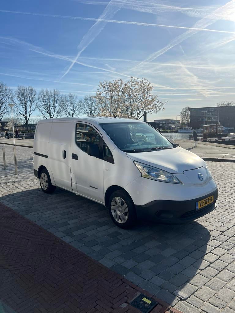 NAP! Nissan E-NV200 | 72.433km Dealeronderhouden, Auto's, Bestelauto's, Stof, Wit, Origineel Nederlands, Elektrisch