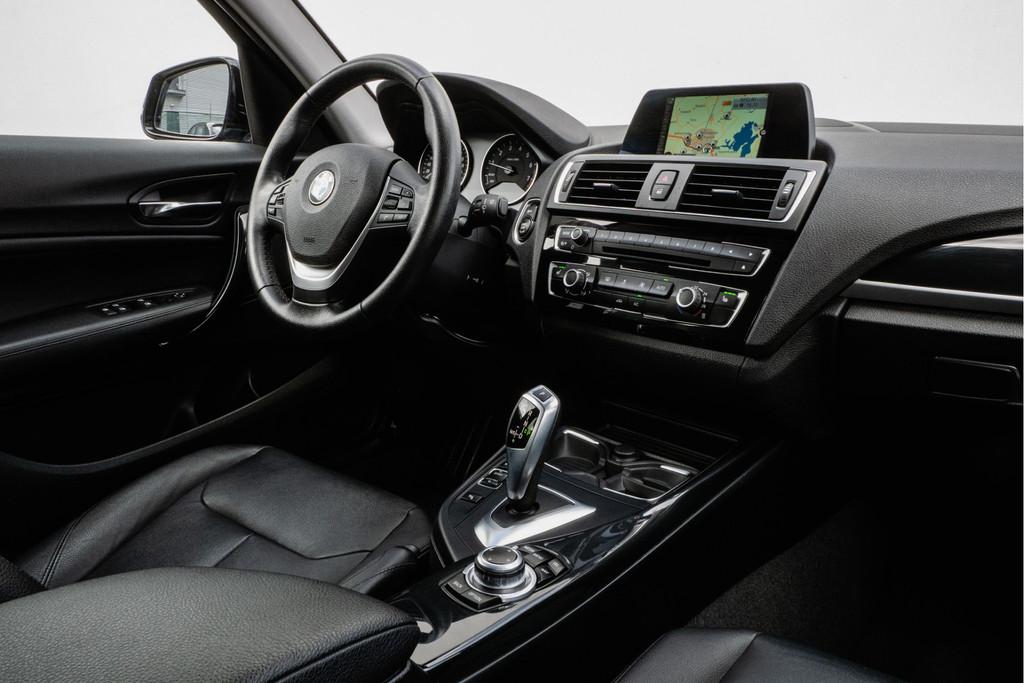 BMW 1-serie 118i 136pk Aut.8 Urban Lederen int/ Stoelverwarm, Auto's, BMW, Gebruikt, Met garantie (alle), Blauw, Leder