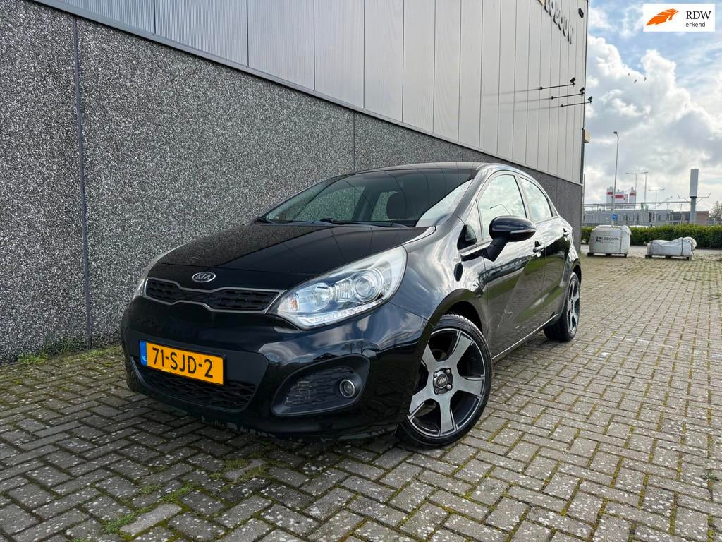 Kia Rio 1.2 CVVT Super Pack/1ste eigenaar/Nieuwe APK en beur, Auto's, Euro 5, Zwart, 4 cilinders, Zwart