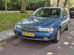 Volvo V70 2.5 T AUT 1997 Blauw, Auto's, Zwart, Blauw, 1476 kg, Stationwagon