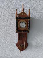 Porte-Montre met klokje, Ophalen