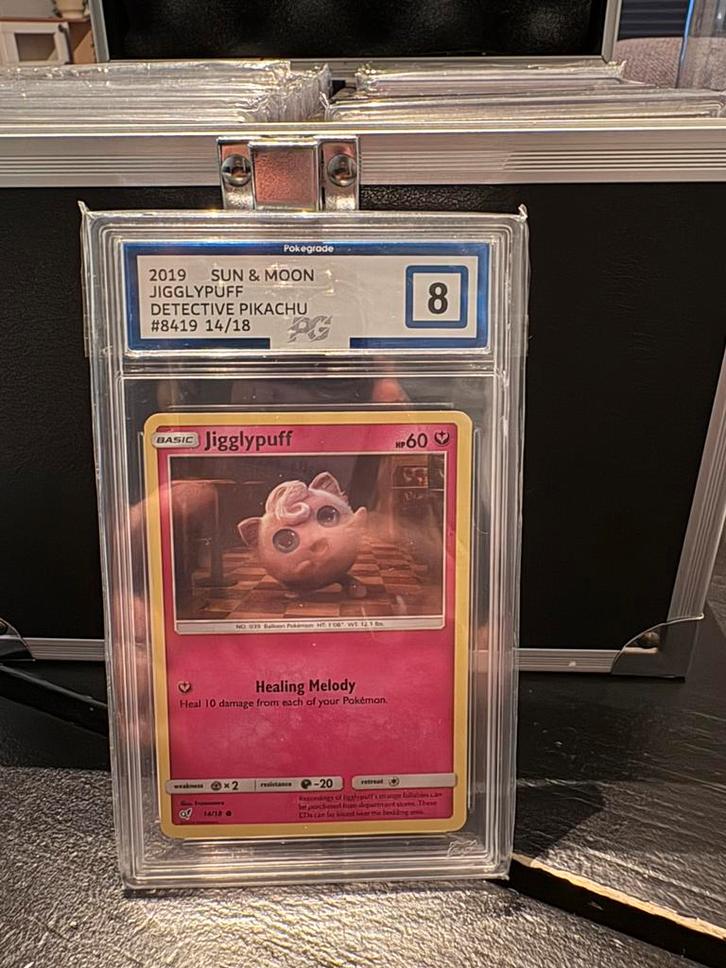 Jigglypuff detective pikachu graded, Hobby en Vrije tijd, Verzamelkaartspellen | Pokémon, Zo goed als nieuw, Meerdere kaarten