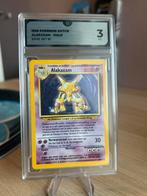 Alakazam Holo – Base Set 1/102 - Graded Card, Ophalen of Verzenden, Zo goed als nieuw