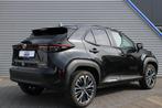 Toyota Yaris Cross 1.5 Hybrid Executive Automaat (bj 2022), Auto's, Gebruikt, Adaptive Cruise Control, Leder en Stof, Zwart