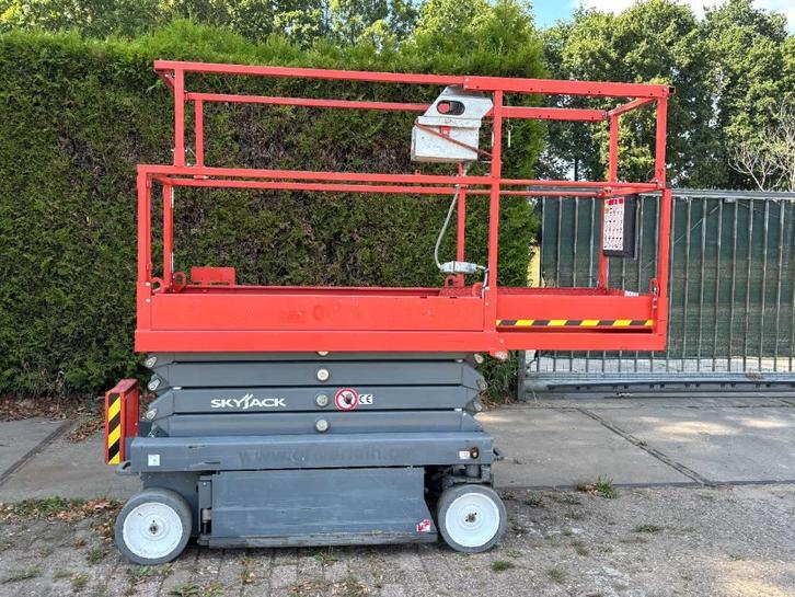 Skyjack SJ3219 hoogwerker schaarhoogwerker 8m skyjack, Zakelijke goederen, Machines en Bouw | Liften, Steigers en Ladders