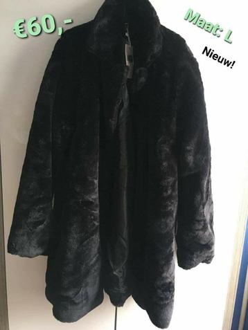 Nieuwe zwarte dames jas maat L.  beschikbaar voor biedingen